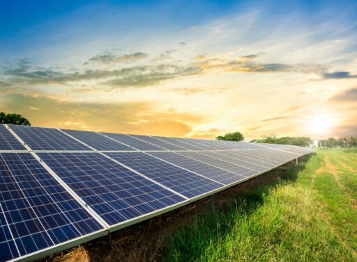 Solar panel with sunset in the background
